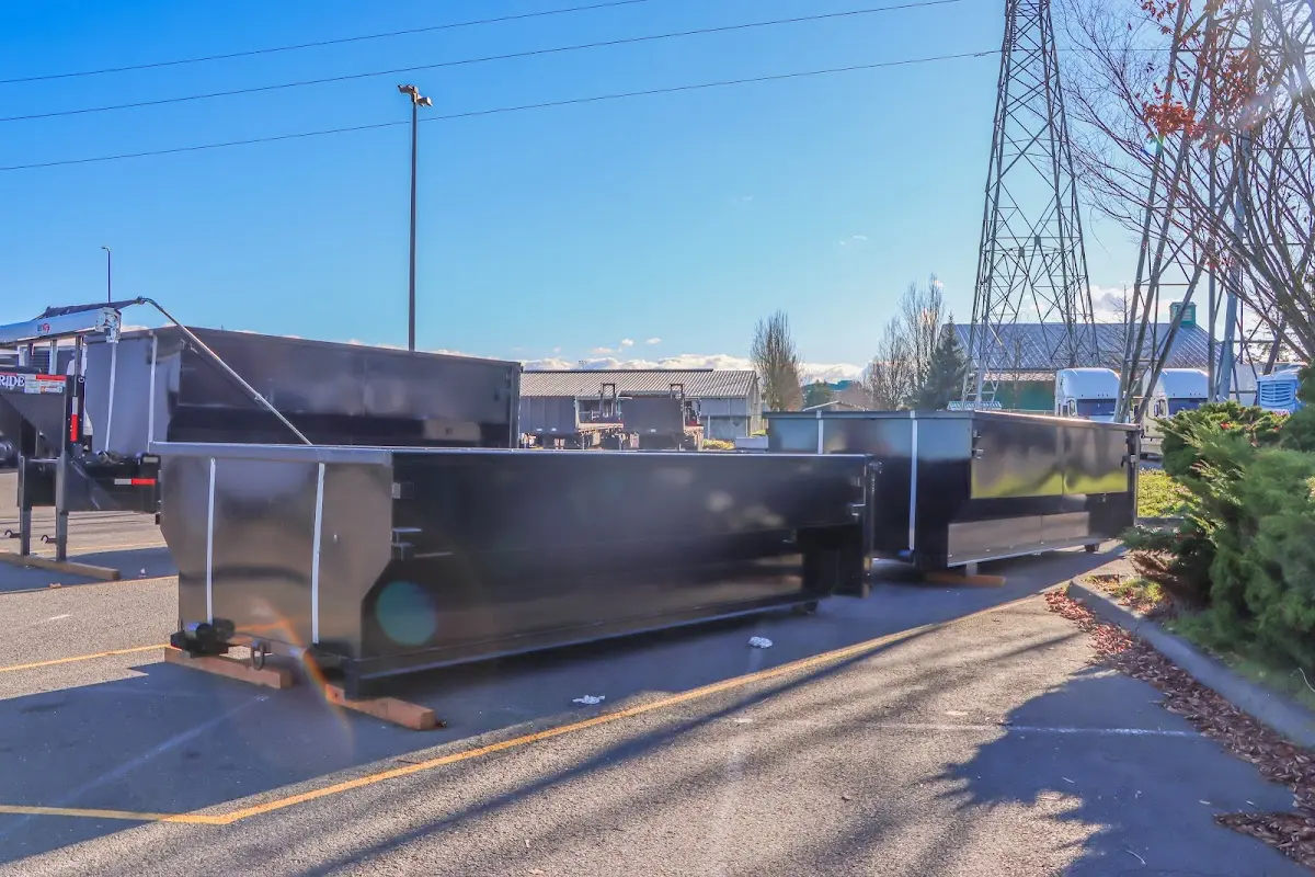 Roll-off dumpster ready for waste disposal at job site for 6 Yard Dumpster Rental in Petoskey